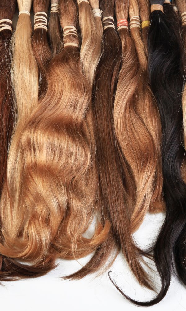 Hair extension equipment of natural hair. hair samples of different colors